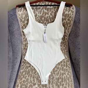 BNWT Coveteur Body Suit (Medium)